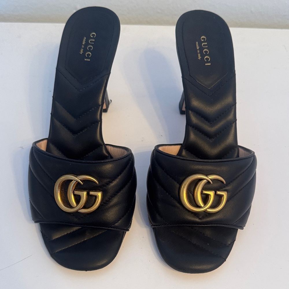 Gucci Black Leather Mules with Gold Logo
